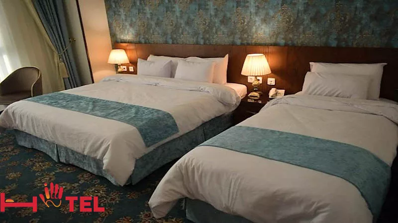 نمایی از اتاق سه تخته هتل شکوه شارستان مشهد